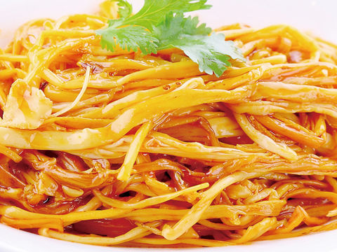 Savory Asian-style noodles dish, garnished with fresh cilantro, ready to serve.