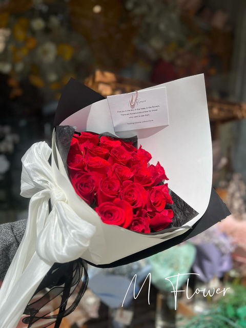 Red rose bouquet, black and white wrap