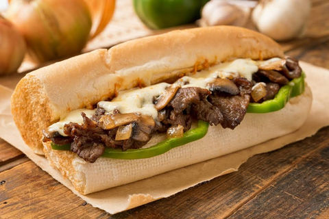 Steak and cheese sub with mushrooms and green peppers