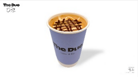 The Duo coffee paper cup, with coffee and chocolate syrup, Coffee & Bar.