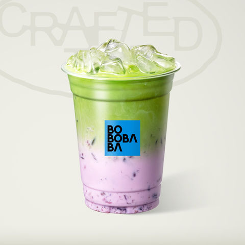 Iced matcha latte drink, BOBOBA logo, CRAFTED text, refreshing drink with ice.