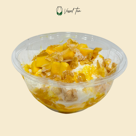 Mango dessert bowl with Vessel Tea logo and visible text on background