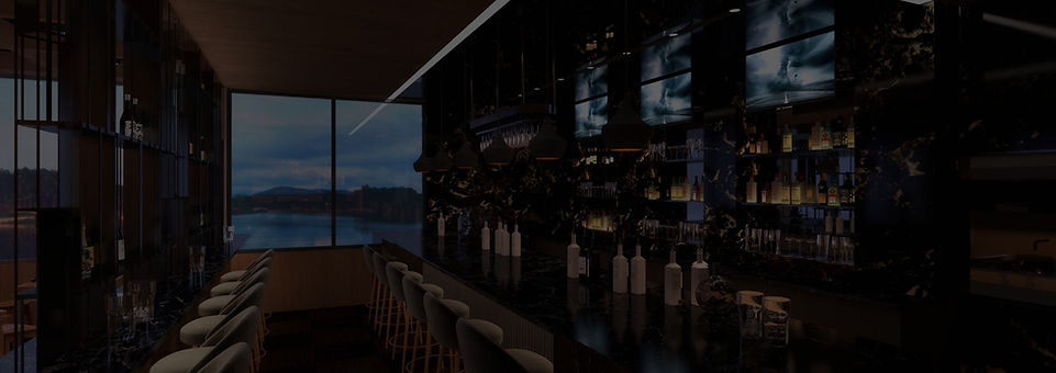 Dark modern bar with stools overlooking a scenic lake view.