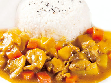Chicken curry with rice, potatoes, and carrots, a delicious Japanese meal.