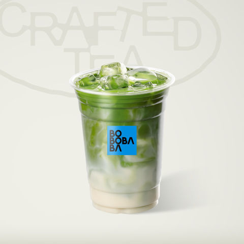 Iced matcha latte in a clear cup with blue logo Crafted Tea BOBOBABA
