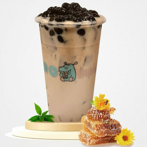 "Moo Bubble" boba milk tea with pearls, honeycomb, and flowers.