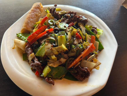 Beef and vegetable dish on white plate, Axia Chinese Bistro, delicious meal