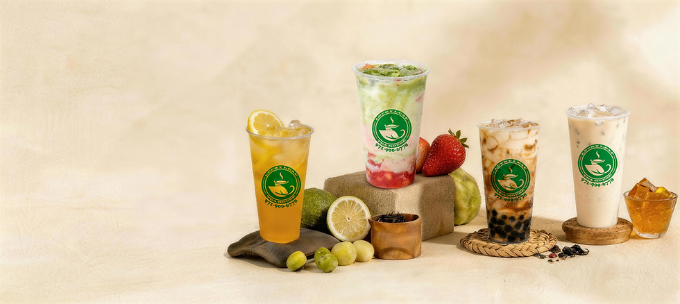 Lemonade and layered fruit drink, with lemons, strawberries, and tea.