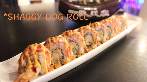 Image of Iggy Dog Roll with visible text on a white plate. Sakura Asian Bistro