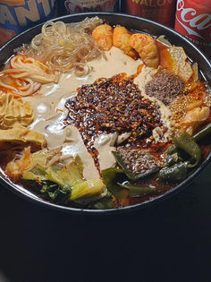 Close-up of a delicious dish containing noodles, tofu, and chili oil. Yang Sao 杨嫂炸串.