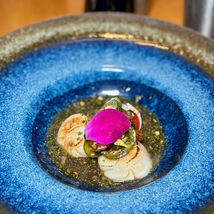 Scallops with a pink flower presentation in a blue bowl, Yoi Sushi