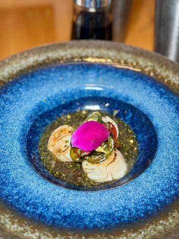 Scallops with a pink flower presentation in a blue bowl, Yoi Sushi