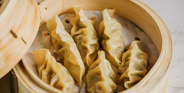 Steaming dumplings in a bamboo steamer at Ma’s Kitchen Dim Sum and Noodles.