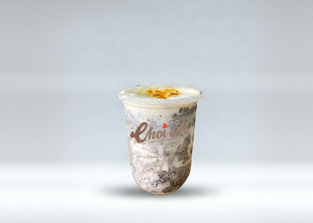 Choi's drink with whipped cream topping. Sweet treat in plastic cup.