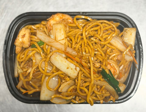 Shrimp Noodles in a black takeout container, Chinese takeaway meal.