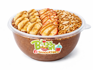 Bliss Bowl & Smoothies bowl with banana, red fruit, granola