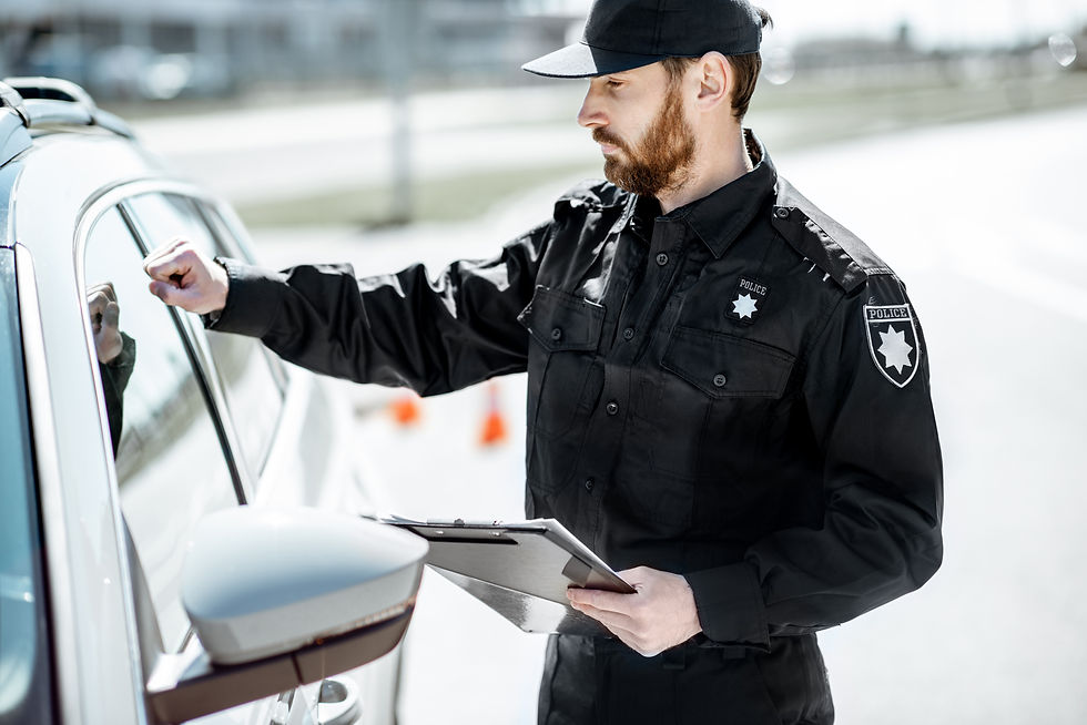 policeman-knocking-at-the-car-window-2025-03-15-23-52-03-utc.jpg
