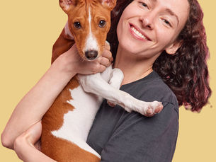 A dog mom with her furry dog baby
