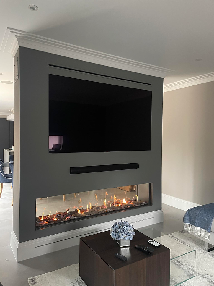 Modern electric fireplace with TV above