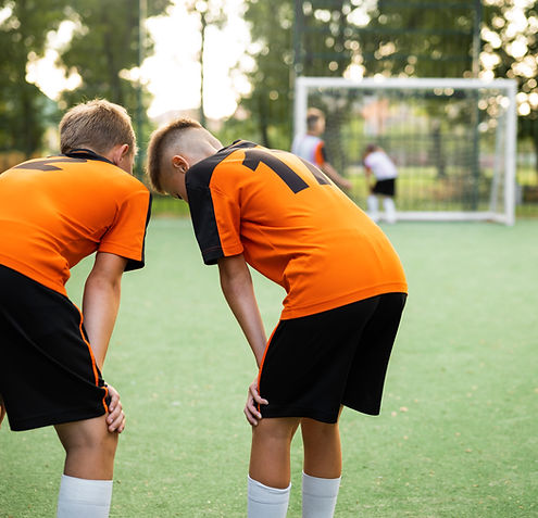 football-trainer-teaching-his-pupils (1).jpg