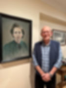 JW: Standing next to a painting of his mother which copies a photo taken of her in Mechelen transit camp