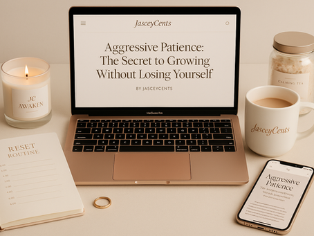 A calm and intentional workspace with a laptop displaying the blog title, a mug labeled "JasceyCents," a lit candle, calling tea jar, and an open notebook with a reset routine symbolizing mindful productivity and inner growth.