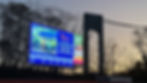 Close-up view of a technician setting up an LED screen at an event venue