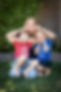 Image of Nicolle with her two sons making silly faces
