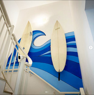 Bringing in the waves | Wall Mural