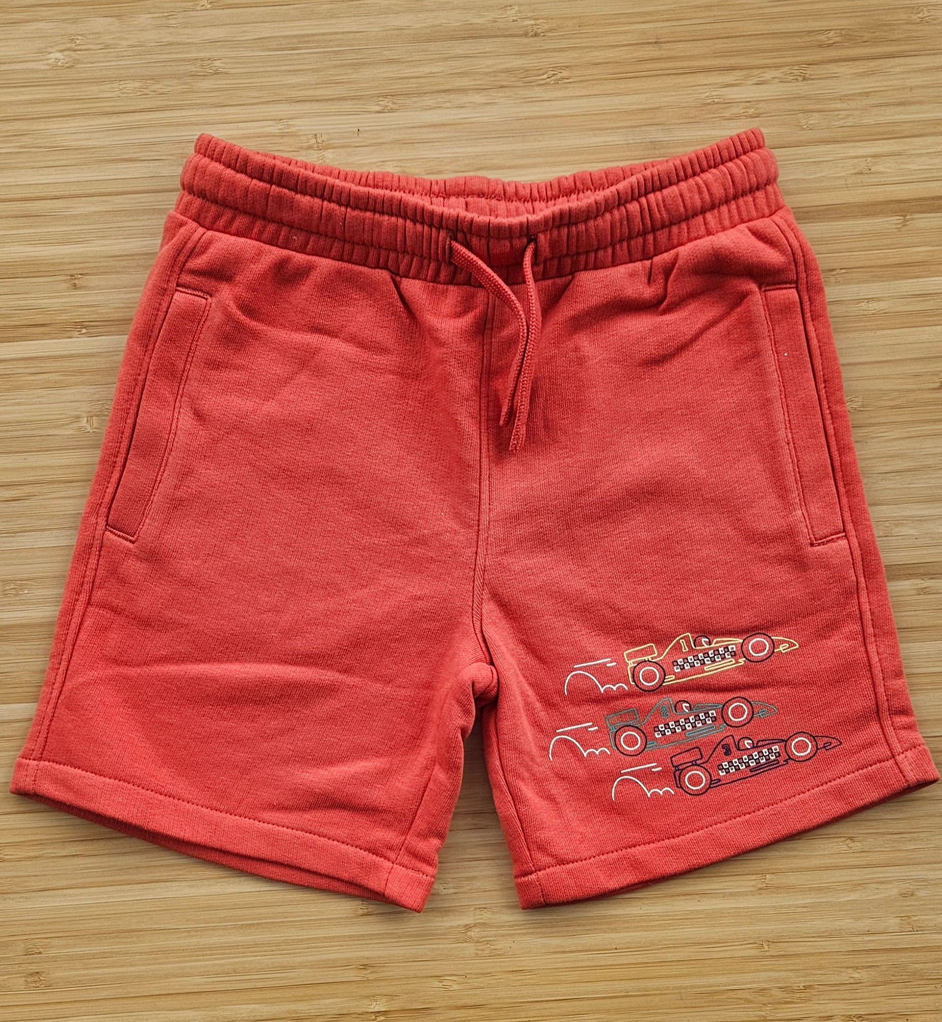 Boys orange racing car shorts 2-8 years