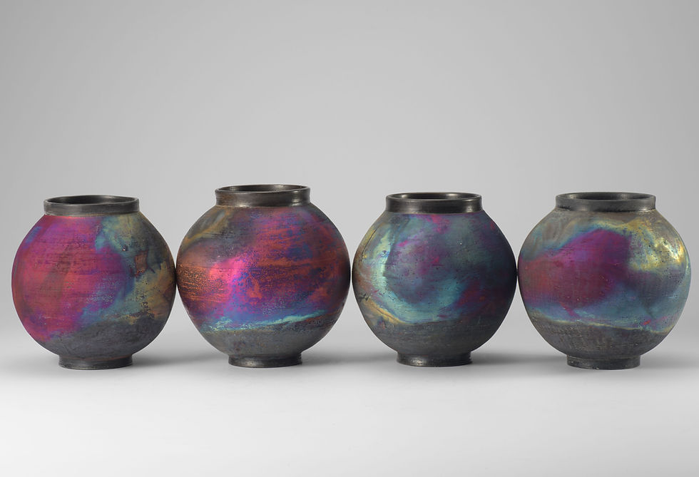 Small Raku Moon Jars.