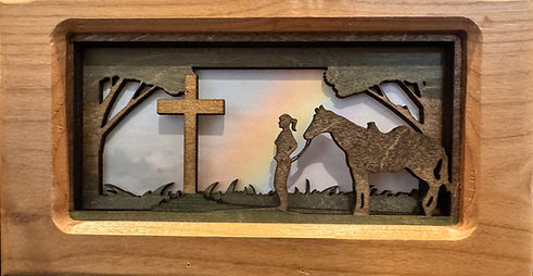 COWGIRL AT THE CROSS