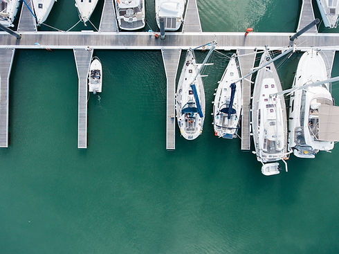 Private yachts docked on pier that you can book with Bucket List Itineraries