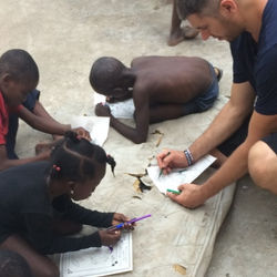 Coloring on the orphanage roof top.