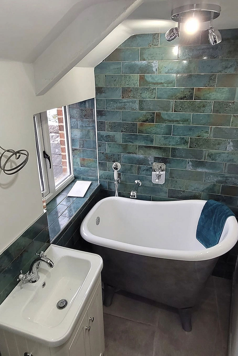 Modern bathroom with freestanding tub and sink