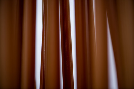 Abstract photography of orange poles