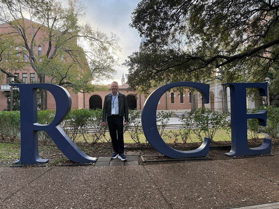 Rice sign with Jim Houser standing in for the "I"

