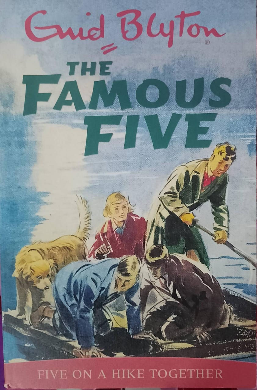 The Famous Five book cover: children and dog investigating
