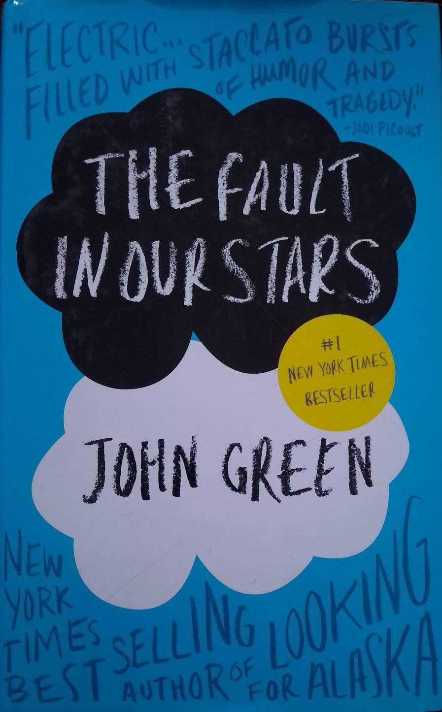 The Fault in Our Stars book cover by John Green, a New York Times bestseller