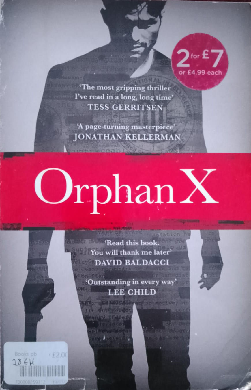 Orphan X book cover with quotes from authors and reviews, close up view.
