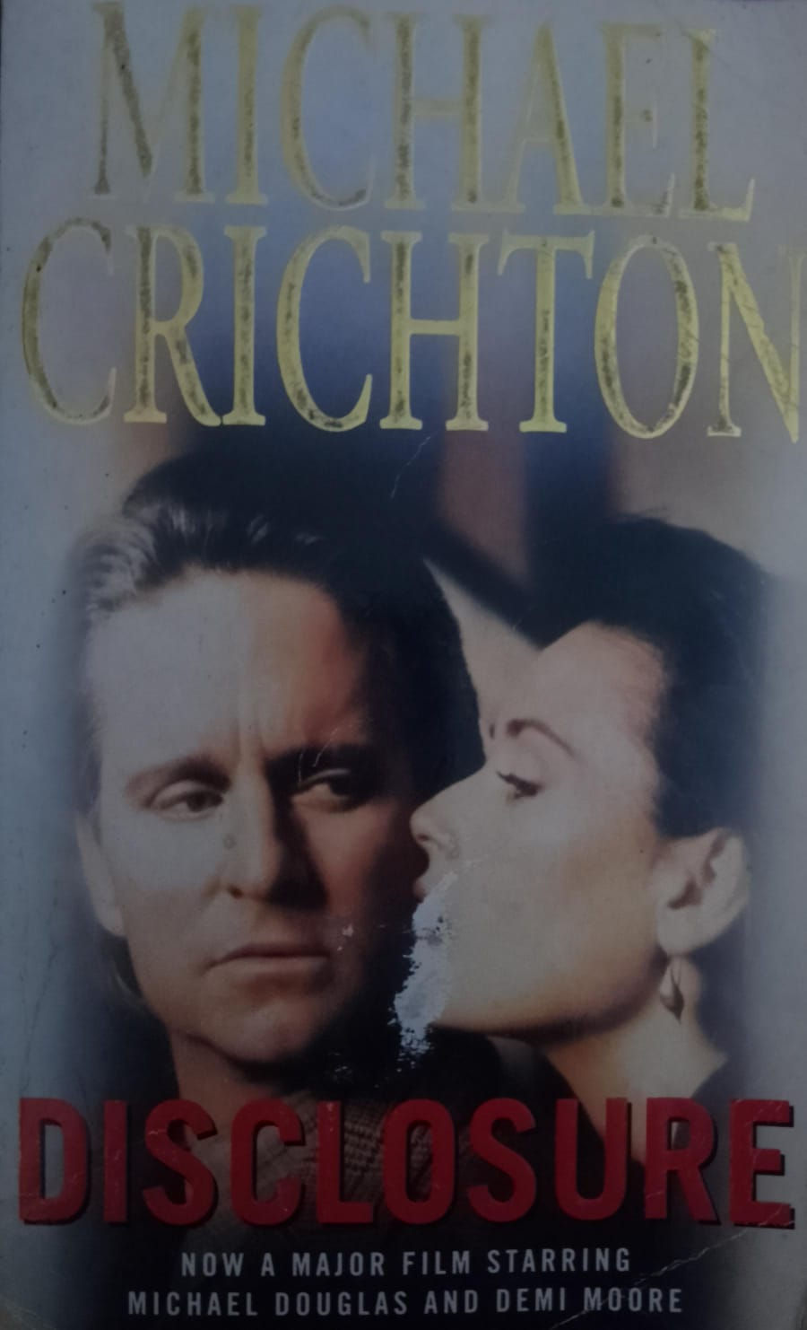 Michael Douglas, Demi Moore, with visible text CRICHTON.