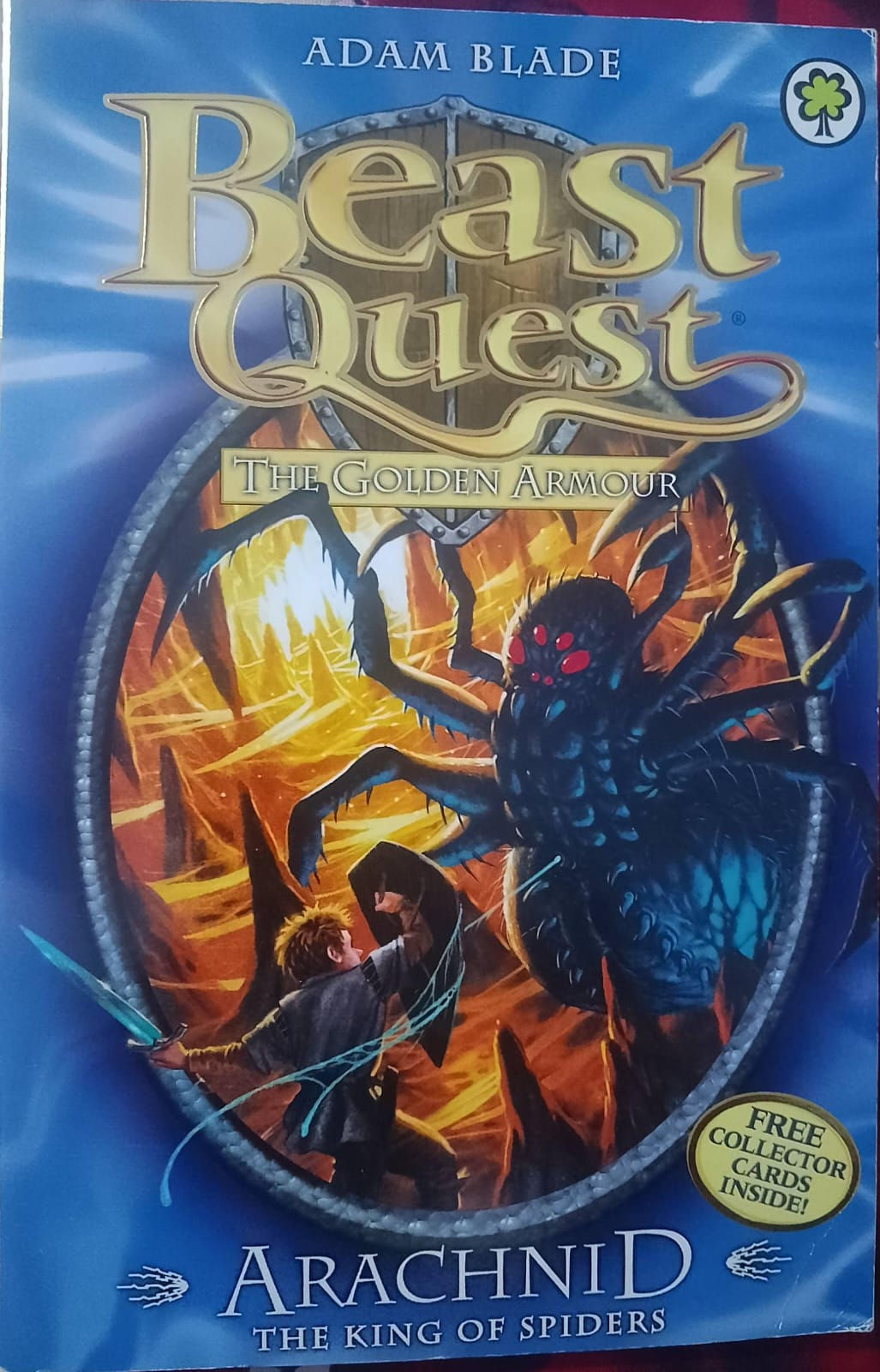 Beast Quest: The Golden Armour book cover featuring a giant spider and a young boy fighting