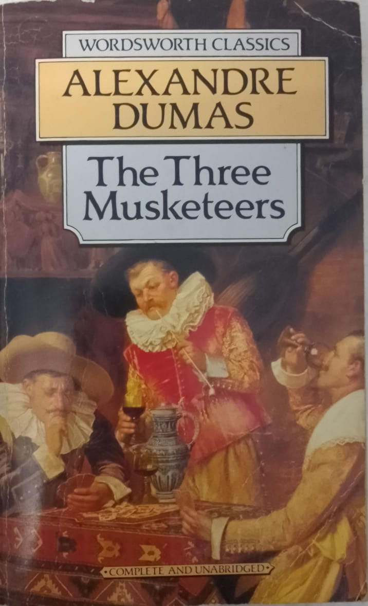 The Three Musketeers by Alexandre Dumas: Book cover depicting men in 17th-century attire