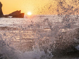 Sunset crashing waves