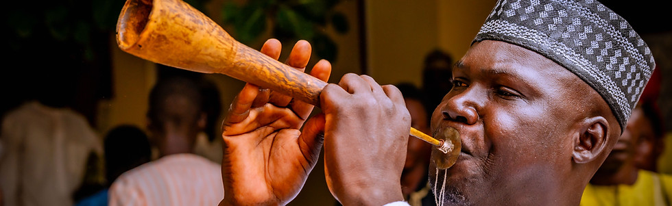man_blowing_echoes_of_bauchi