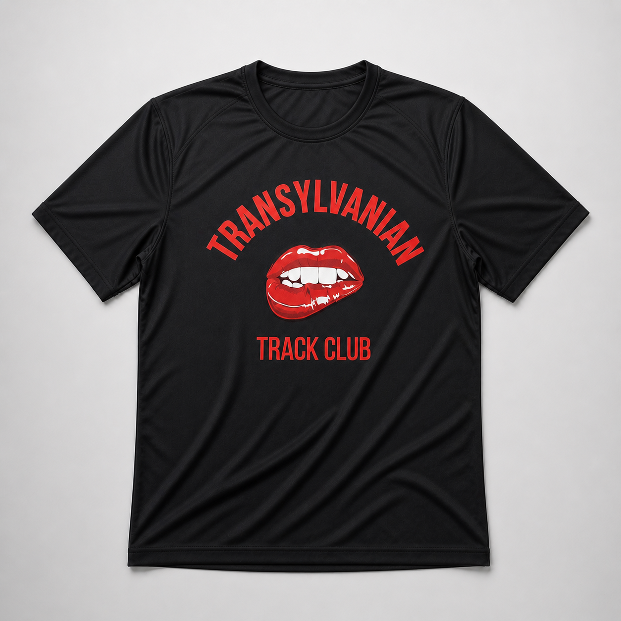 Black technical running T-shirt featuring red Transylvanian Track Club text with a red lips graphic at the centre.