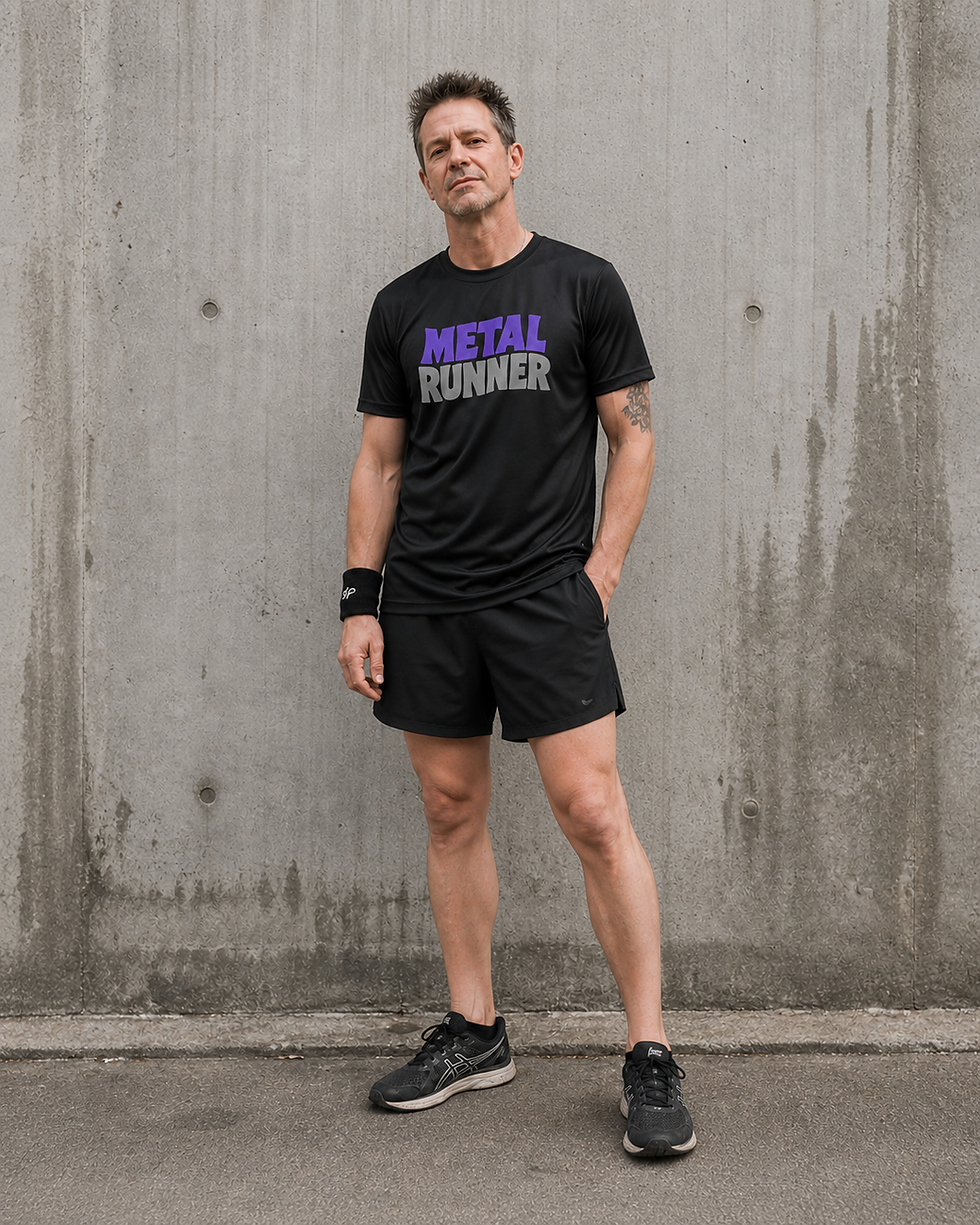 Thumbnail: Male model wearing the Metal Runner technical running shirt with purple and grey alternative running graphic.