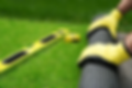 contractor-unrolling-artificial-turf-roll.png