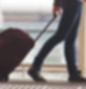 Person Rolling Suitcase in Airport_edited.jpg