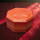 Miniatura: Boîte à bijoux orange octogonale, Fleur de Vie gravée, sur fond rouge foncé. Boîte à bijoux Fleur de Vie.